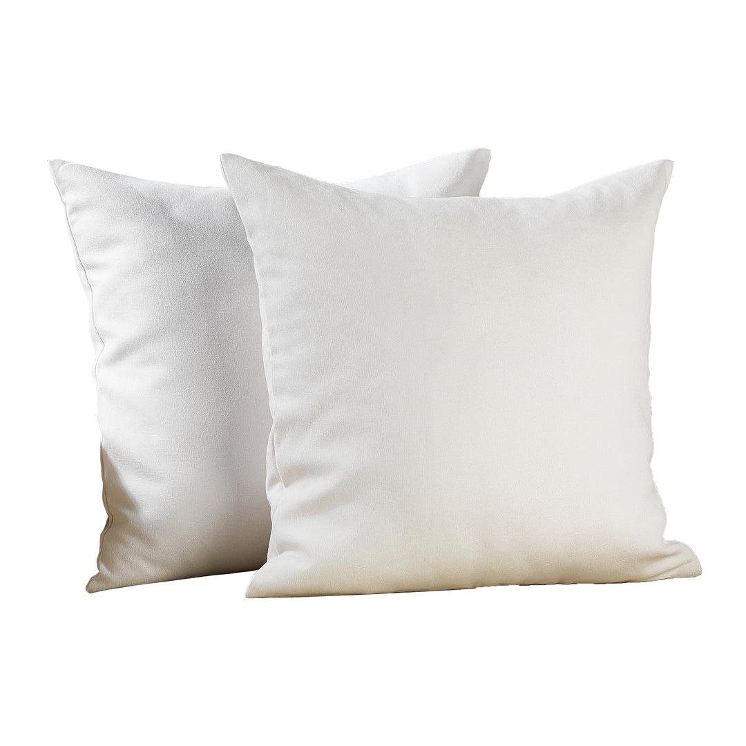 A made to measure cushion cover in pure white velour, displayed from the side with a smooth lightweight texture and neatly finished seams for a refined decorative style