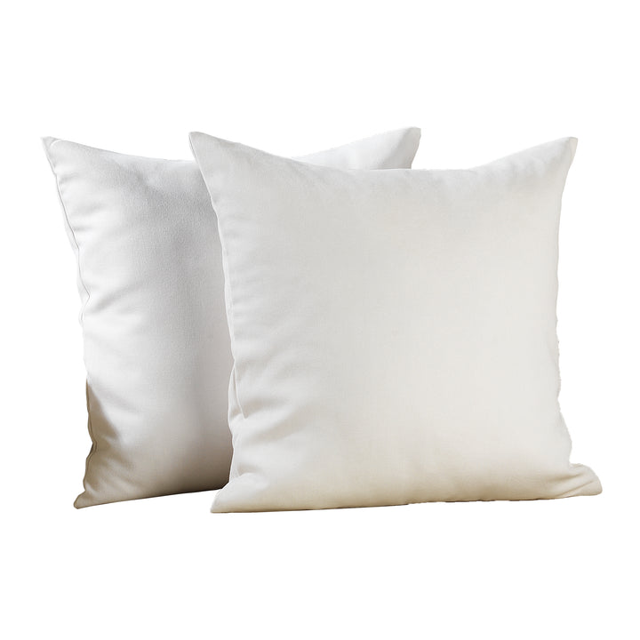 A made to measure cushion cover in pure white velour, displayed from the side with a smooth lightweight texture and neatly finished seams for a refined decorative style