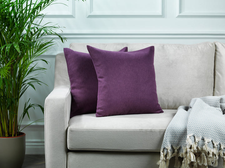 A made to measure cushion cover in soft purple linen‑look fabric, featuring a subtle woven texture and neatly tailored seams for a gentle elegant look