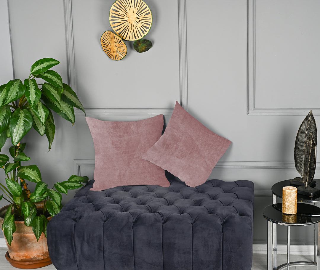  A made to measure cushion cover in soft raspberry‑pink matte velvet, shown with a plush smooth texture and crisp edges for a delicate premium style