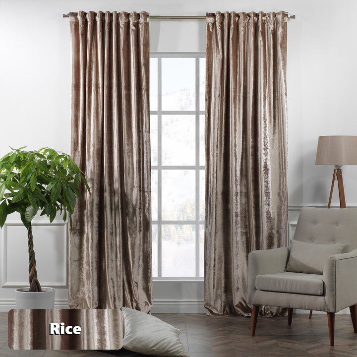 Rice shiny velvet eyelet curtain panel featuring easy‑glide rings and a soft, flowing fall