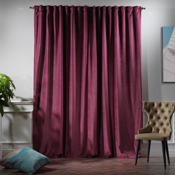 Blush pink velvet curtain panel offering gentle colour and full‑length fall.
