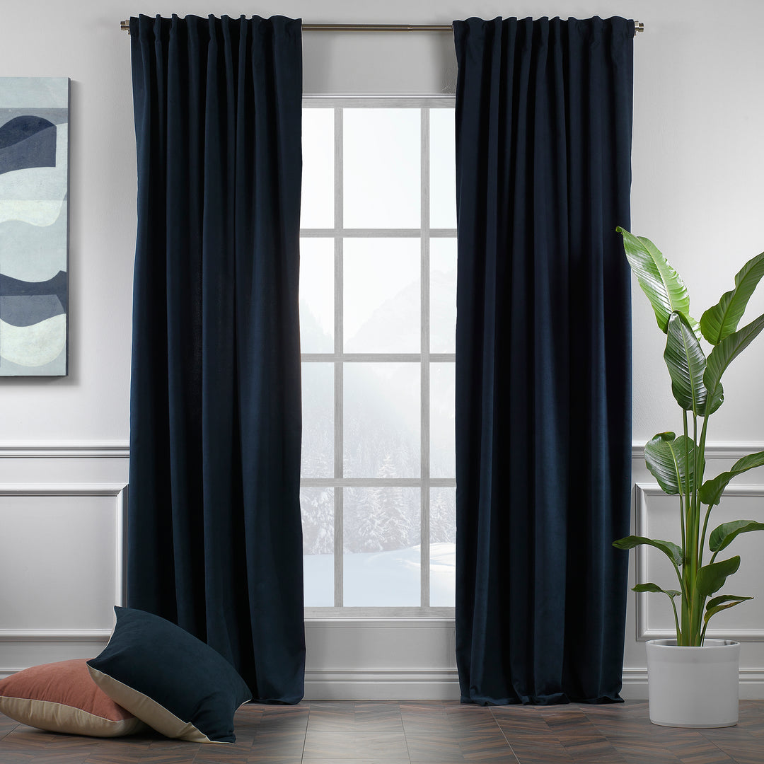 Royal blue velour curtains shown in daylight, highlighting rich saturated tone, smooth pile and elegant drape, made to measure and available by the metre.