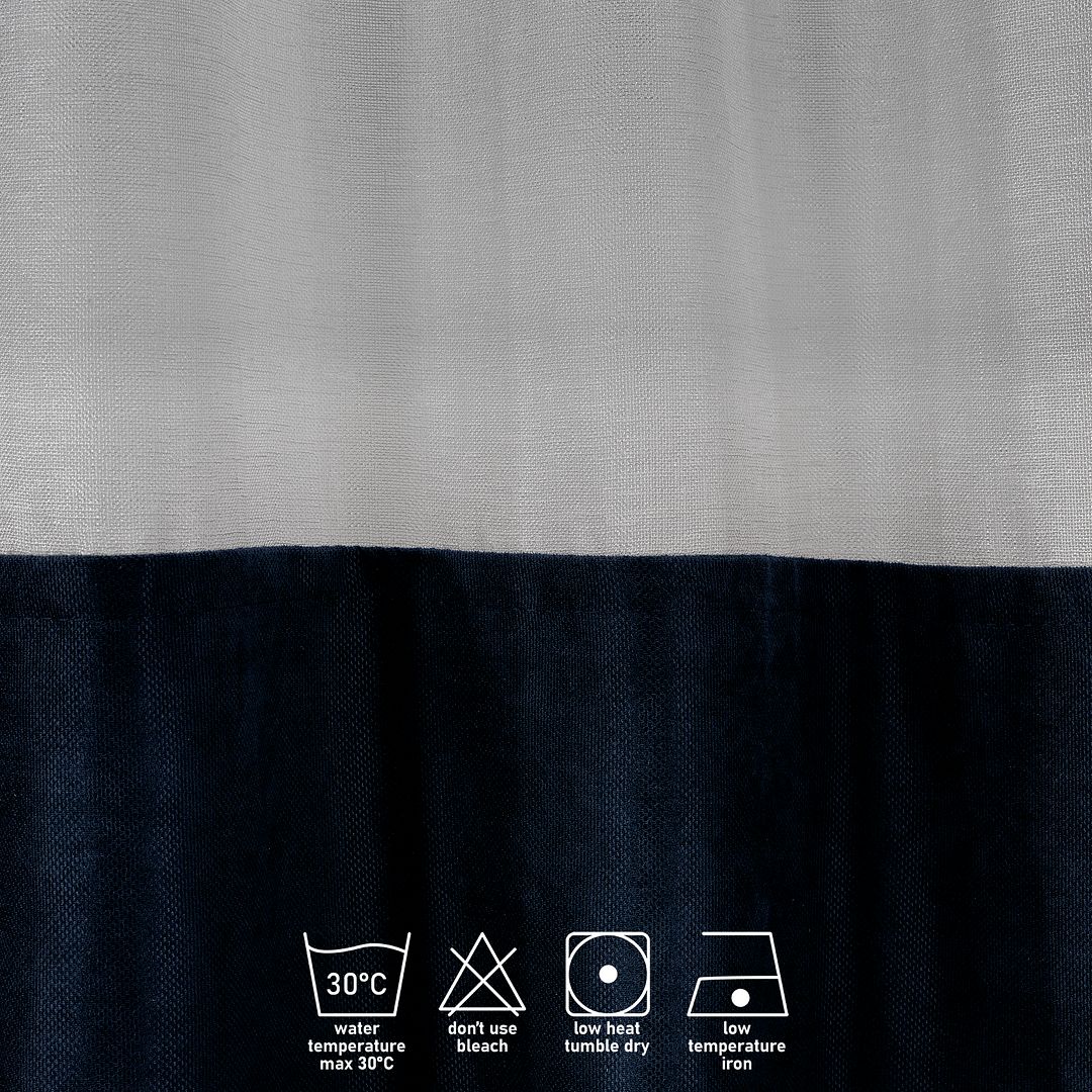 A close‑up of a royal blue velvet and sheer block curtain, showing the plush velvet texture and delicate sheer backing
