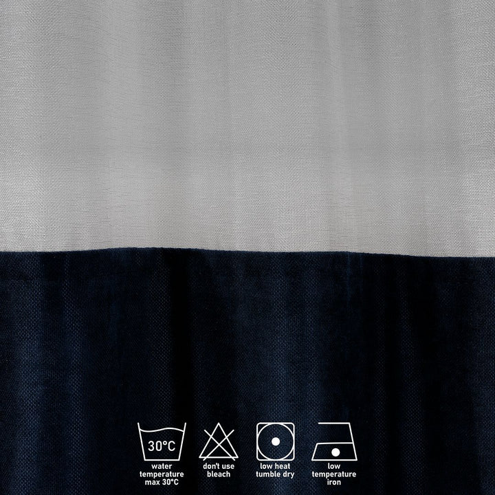 A close‑up of a royal blue velvet and sheer block curtain, showing the plush velvet texture and delicate sheer backing
