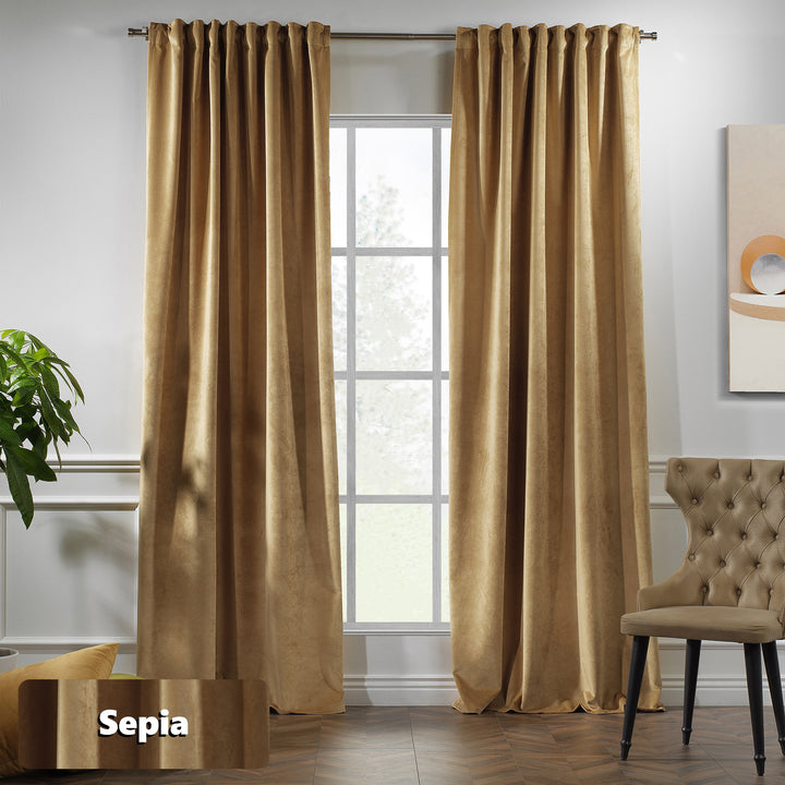 Soft tan velvet eyelet curtain panel with long, relaxed fall.