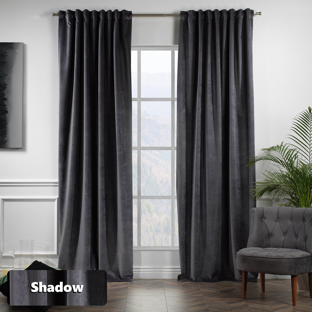 Extra‑long deep dark gray matte velvet eyelet curtain with modern ring detailing and a relaxed, elegant fall.