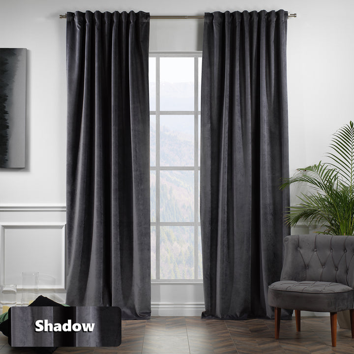 Extra‑long deep dark gray matte velvet eyelet curtain with modern ring detailing and a relaxed, elegant fall.