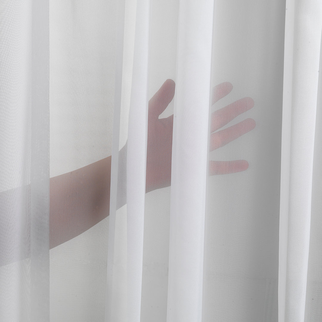 Macro silk fabric detail showing natural sheen, fine weave and smooth surface texture.

