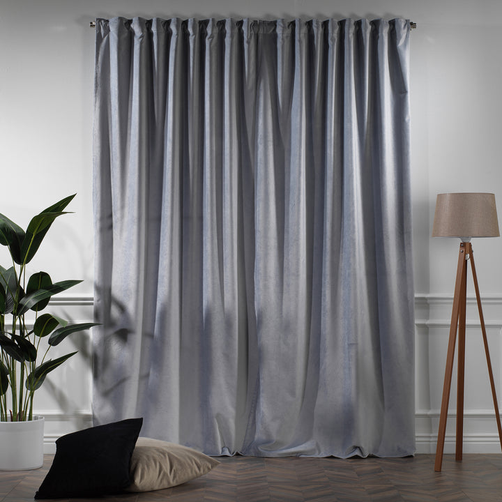 Full‑length silver matte velvet curtain offering generous width and a calm, elegant appearance.