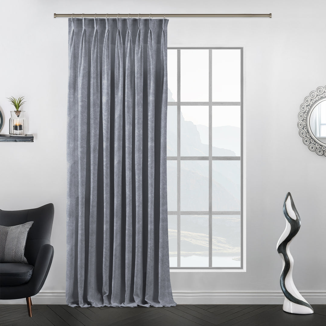 Extra‑wide silver matte velvet pinch pleat curtain with deep, uniform folds and a luxury handcrafted look.