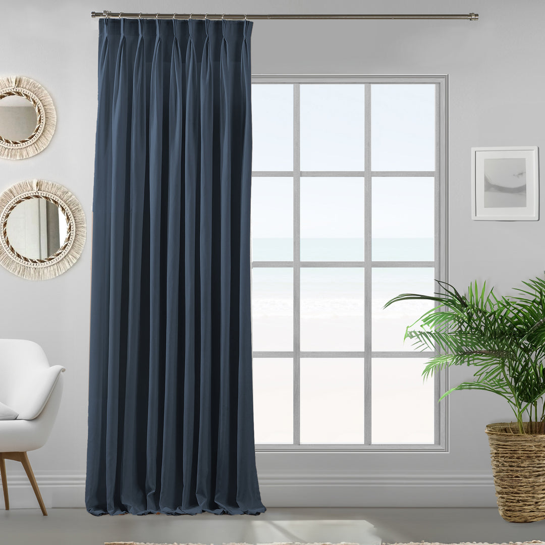 Pinch pleated  single sky blue velour curtain panel showing soft drape and refined matte finish, made to measure and available by the metre.