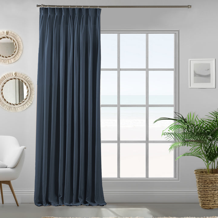 Pinch pleated  single sky blue velour curtain panel showing soft drape and refined matte finish, made to measure and available by the metre.