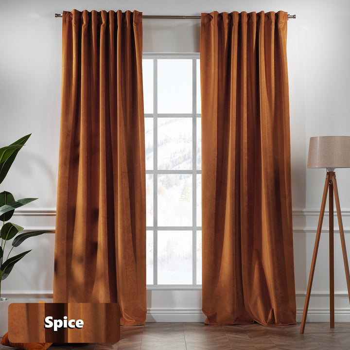 Spice matte velvet eyelet curtain with metal ring top and warm rust‑orange drape