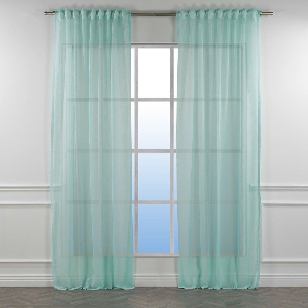 Blue green linen sheer curtain with rod‑pocket header in a contemporary living room, cool airy transparency.