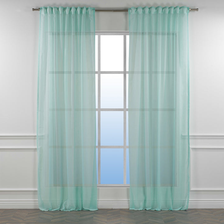 Blue green linen sheer curtain with rod‑pocket header in a contemporary living room, cool airy transparency.