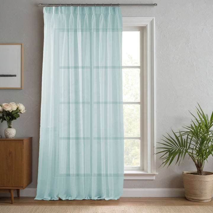 Teal green linen‑sheer curtain made to measure with deep pinch pleats and fresh cool light diffusion.