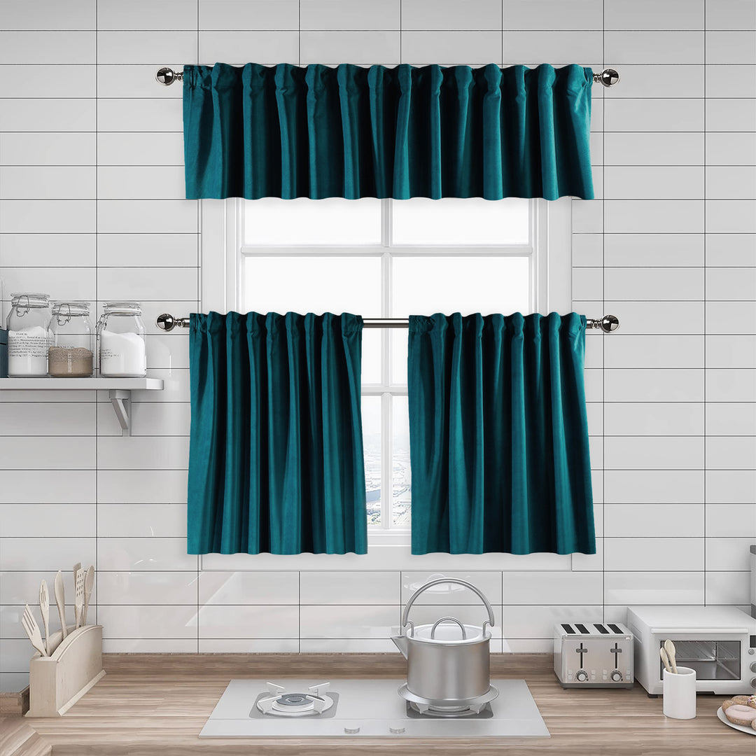 A made to measure kitchen valance in deep teal matte velvet, shown with a smooth plush texture and clean structured edges for a rich elegant appearance