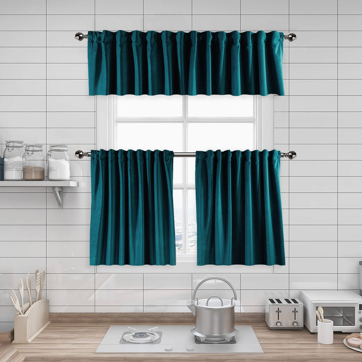 A made to measure kitchen valance in deep teal matte velvet, shown with a smooth plush texture and clean structured edges for a rich elegant appearance