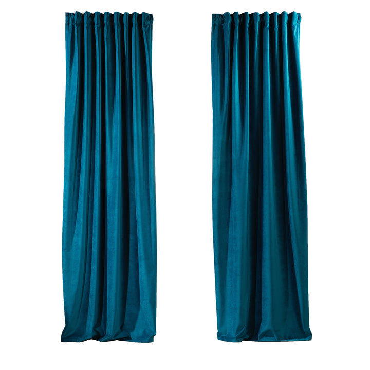 Extra‑wide matte velvet eyelet curtain offering a long, uninterrupted fall.