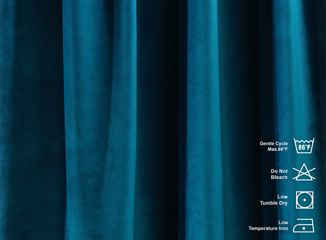 Blue fabric with washing instructions on a dark background