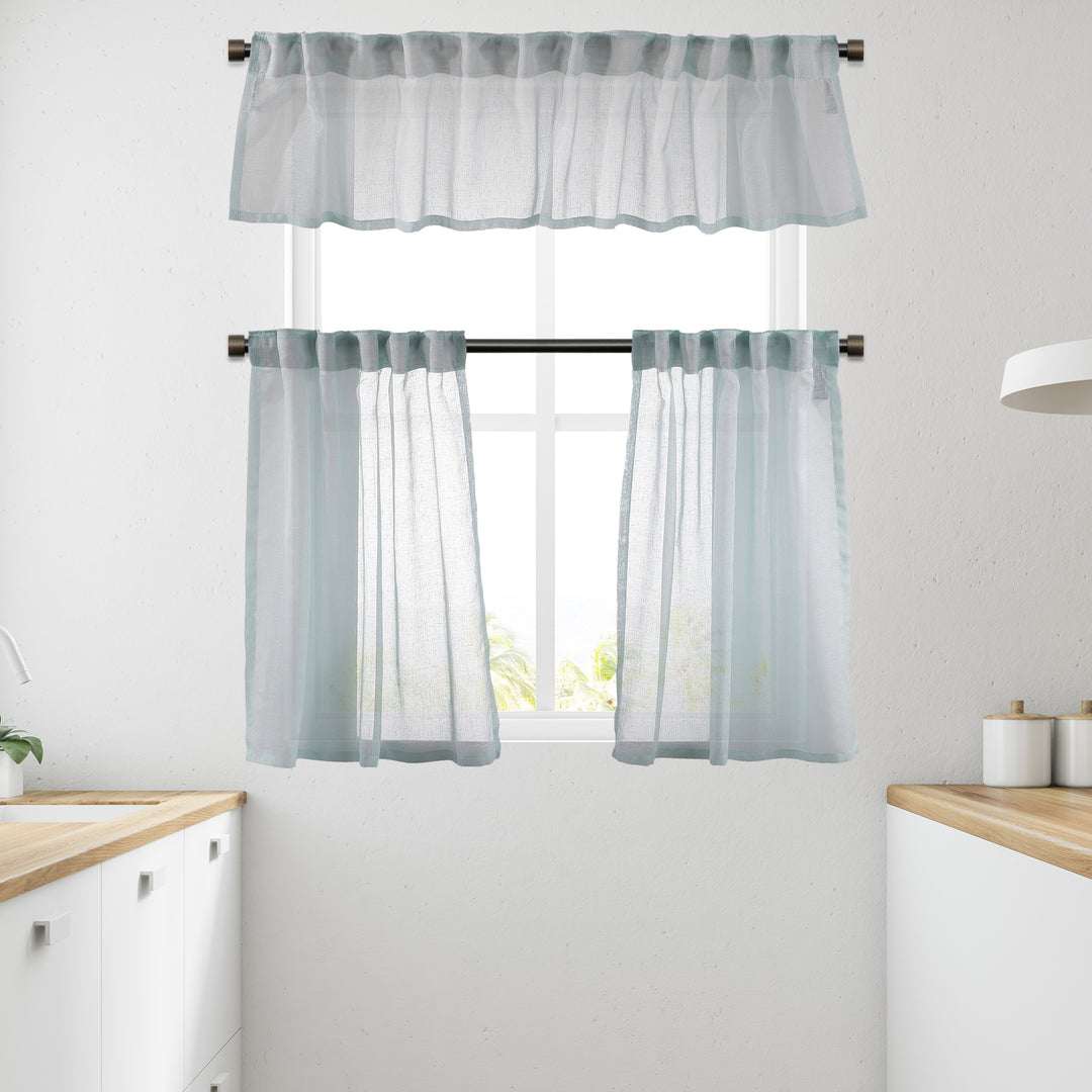 Teal green linen‑look sheer valance with textured weave, soft daylight translucency and lightweight drape.