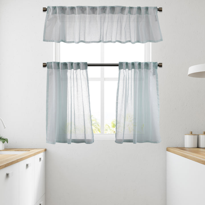 Teal green linen‑look sheer valance with textured weave, soft daylight translucency and lightweight drape.