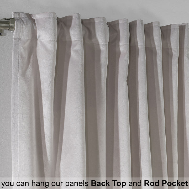 Close‑up of matte velvet curtain fabric showing dense weave and soft‑touch matte texture.