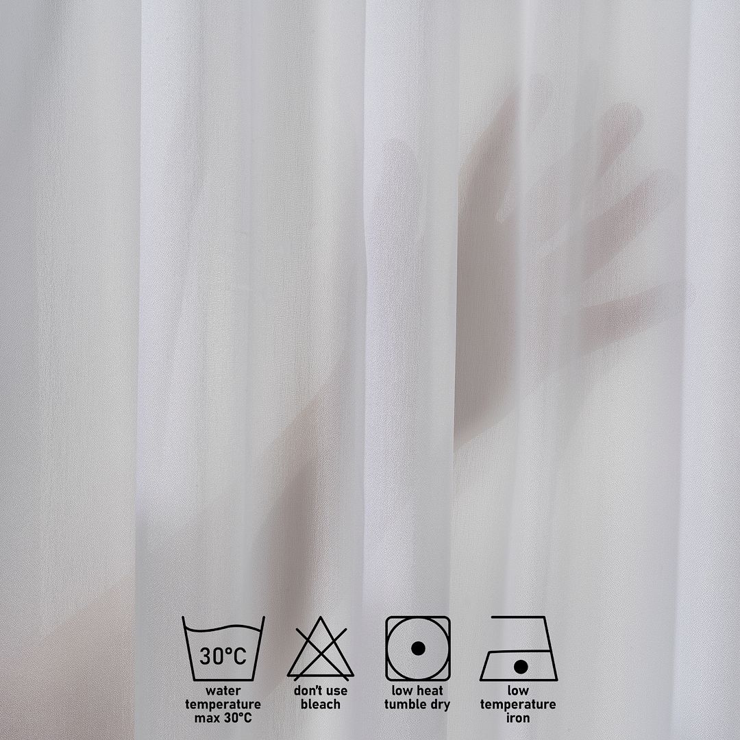 Close‑up of White silk‑crepe curtain fabric showing fine crepe texture
