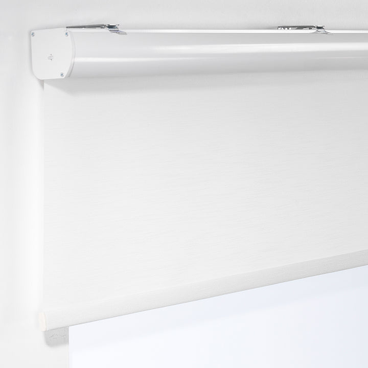 White linen‑look daylight roller blind with soft woven texture and a clean, diffused light finish