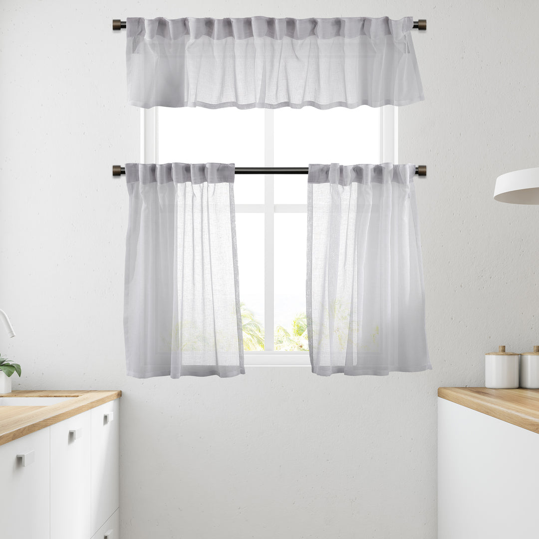 White linen‑look sheer valance with natural texture, crisp daylight translucency and smooth fall.