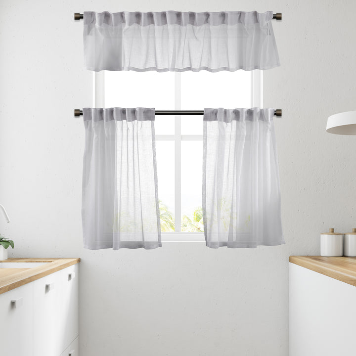 White linen‑look sheer valance with natural texture, crisp daylight translucency and smooth fall.