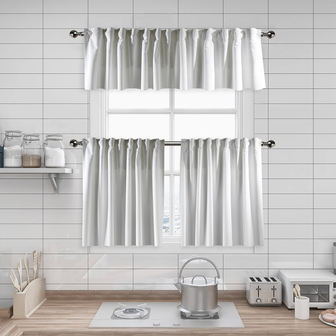 Kitchen window with white curtains in a modern kitchen setting