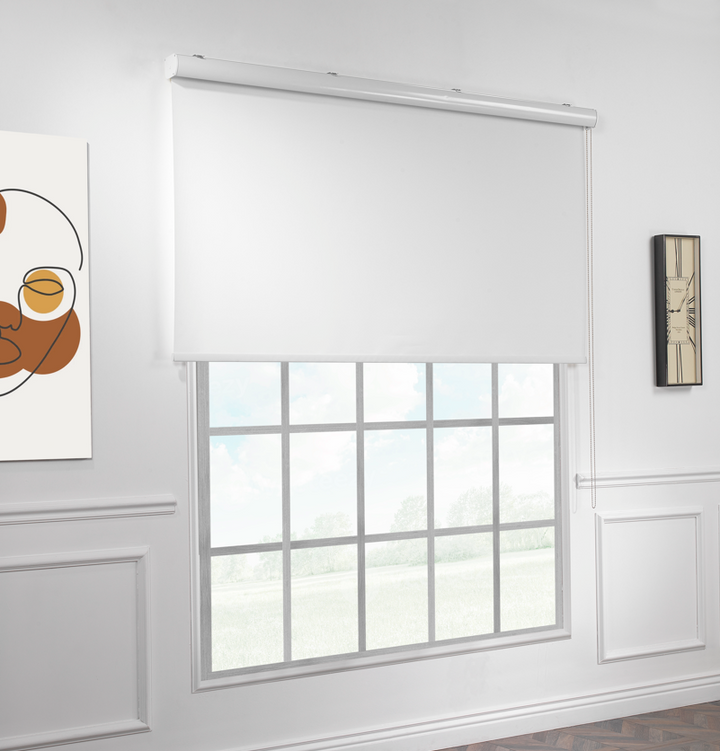 White blackout roller blind made to measure with a smooth matte finish and strong light blocking ideal for bedrooms and modern interiors