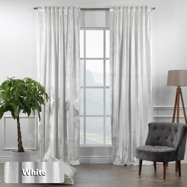 White  glossy velvet multi‑way curtain featuring flexible installation and a calm, elegant drop