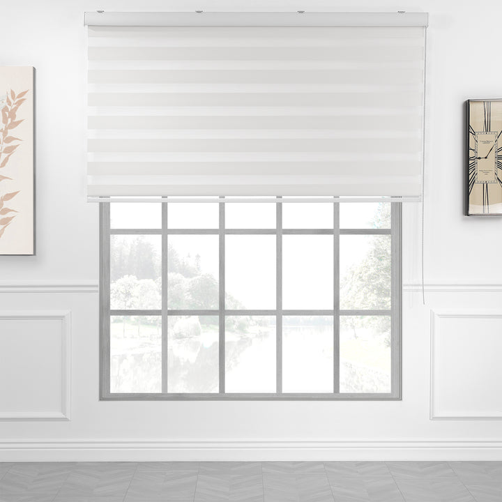Made to measure solid plain white zebra roller blind featuring clean alternating sheer and dim‑out stripes for bright, adjustable light control and privacy, showcasing its crisp white tone, smooth texture and modern day‑and‑night blind design.