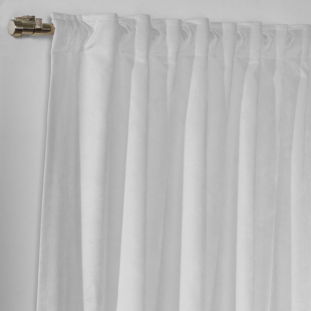 A close‑up of a white and blue matte velvet block curtain, highlighting the soft texture, clean stitching and refined colour contrast