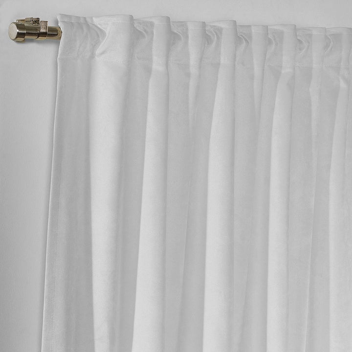 A close‑up of a white and blue matte velvet block curtain, highlighting the soft texture, clean stitching and refined colour contrast