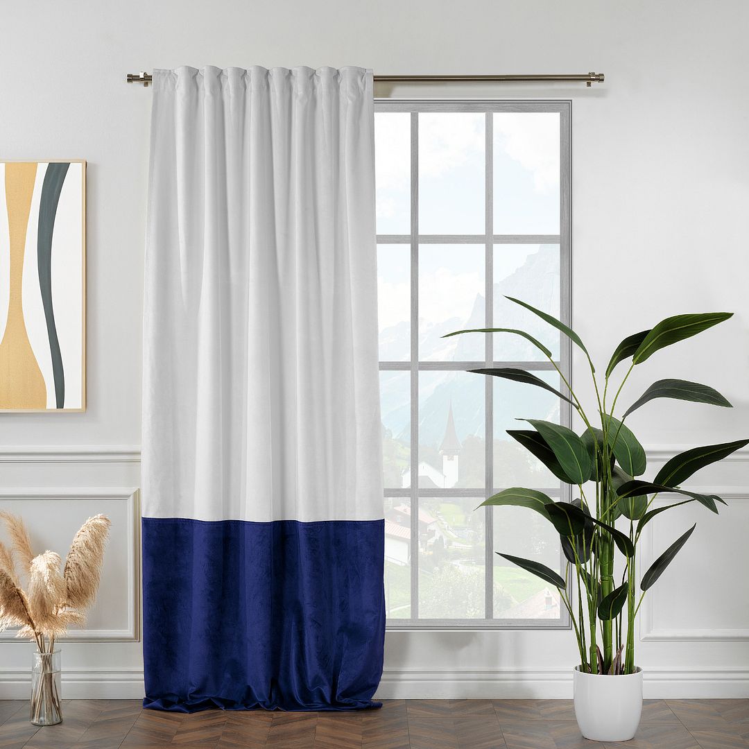  A made to measure velvet block curtain in white and midnight blue, featuring deep contrast, smooth drape and a premium tailored finish