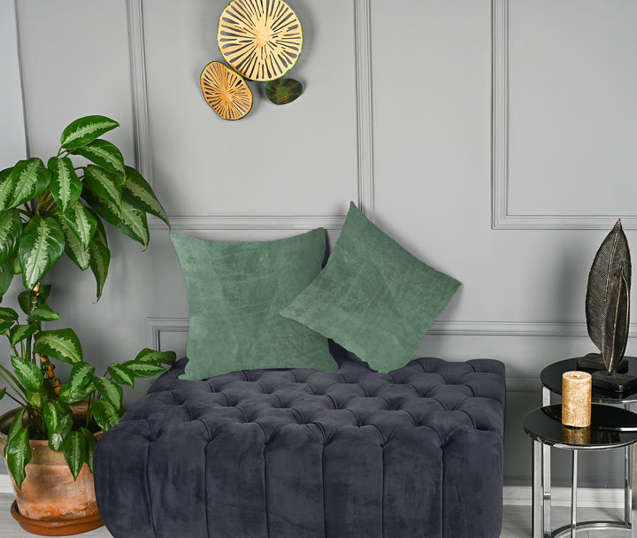 A made to measure cushion cover in muted sage‑green matte velvet, shown with a soft plush texture and clean seams for a calm natural look