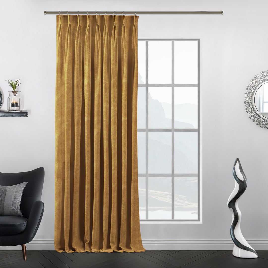 Yellow pinch pleat velvet curtain, extra‑wide fullness and elegant folds.