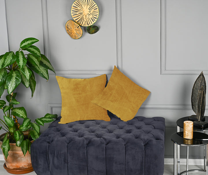 A made to measure cushion cover in classic warm‑yellow matte velvet, displaying a velvety surface and clean structured seams for a bright premium look