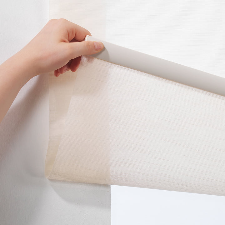 A clean front‑facing image of an ecru linen‑look room darkening roller blind with a soft woven texture and balanced light reduction
