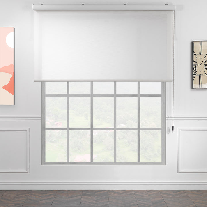 A white linen‑look room darkening roller blind made to measure, photographed with a soft woven finish and balanced light reduction